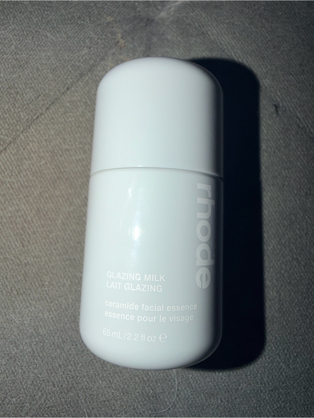 RHODE Glazing Milk Ceramide Facial Essence — White Bottle